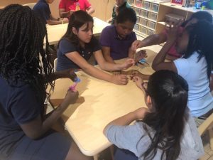 kids building a tower together